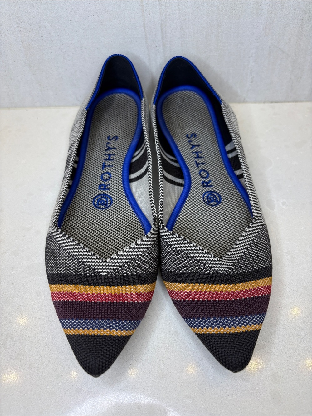 Rothy's Black Knit Pointed Flats with Red, Yellow & Blue Stripes - Size 7.5